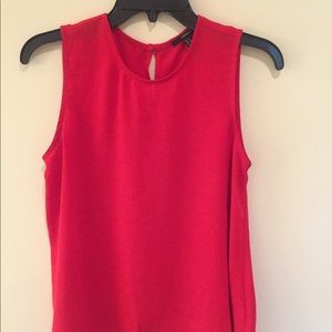 Red formal top, covers shoulder